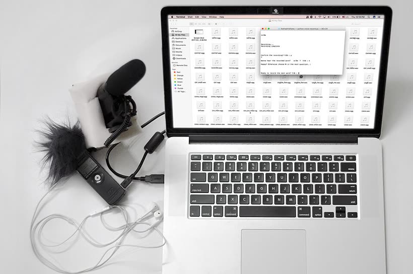 Home podcast recording setup with a microphone and headphones